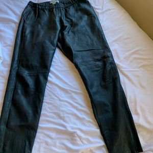 Black leather pants. It is super comfortable. My height is 4’11.